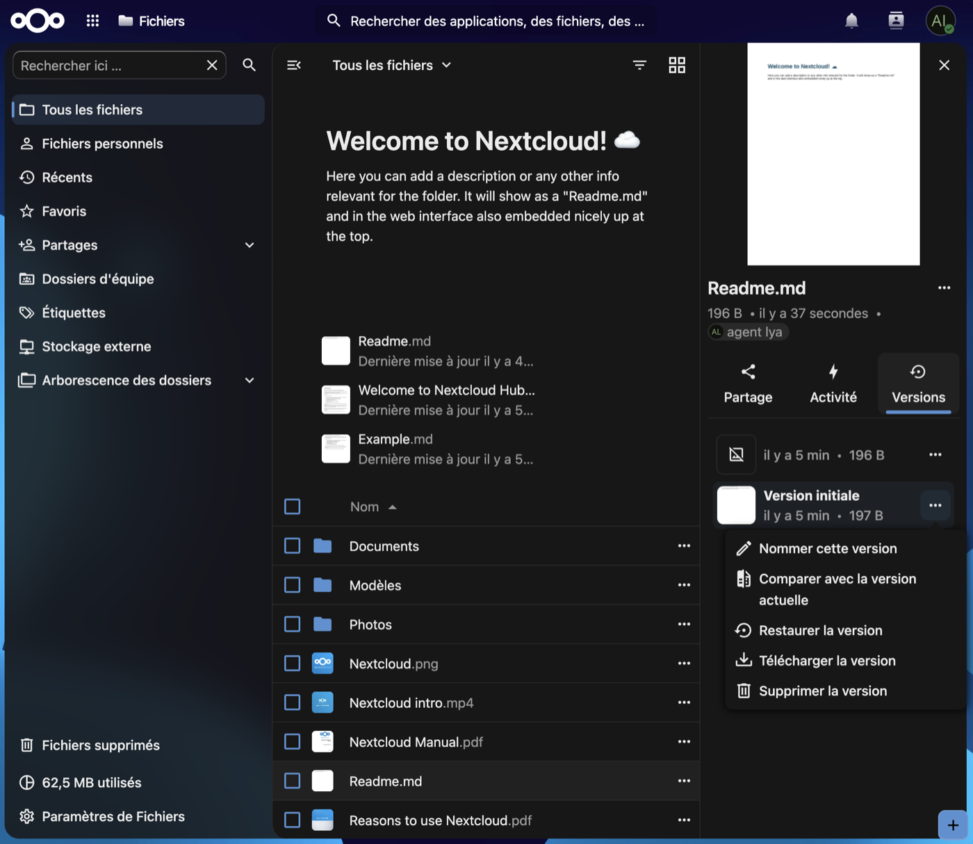 Onglet Versions d'un fichier dans Nextcloud, avec le menu d'une version ouvert sur Restaurer la version
